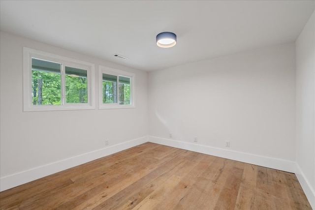 1220 Walnut Rdg, Ellijay, GA 30536 - spare room with baseboards and light wood-style flooring