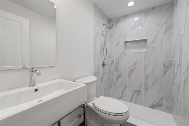 1220 Walnut Rdg, Ellijay, GA 30536 - bathroom with toilet, a tile shower, vanity, and recessed lighting