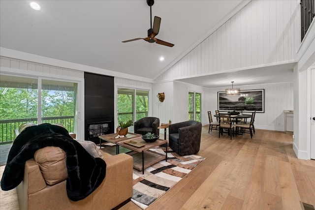 1220 Walnut Rdg, Ellijay, GA 30536 - living area with light wood-style flooring, ceiling fan, a chandelier, high vaulted ceiling, and a fireplace