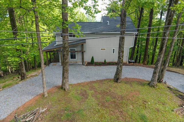 1220 Walnut Rdg, Ellijay, GA 30536 - view of property exterior featuring gravel driveway and roof with shingles