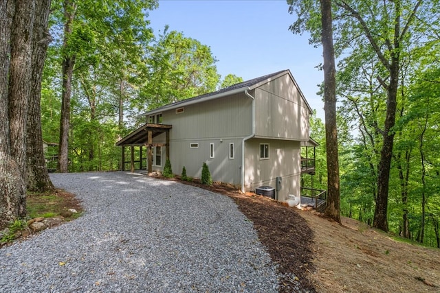 1220 Walnut Rdg, Ellijay, GA 30536 - view of side of home featuring driveway and cooling unit