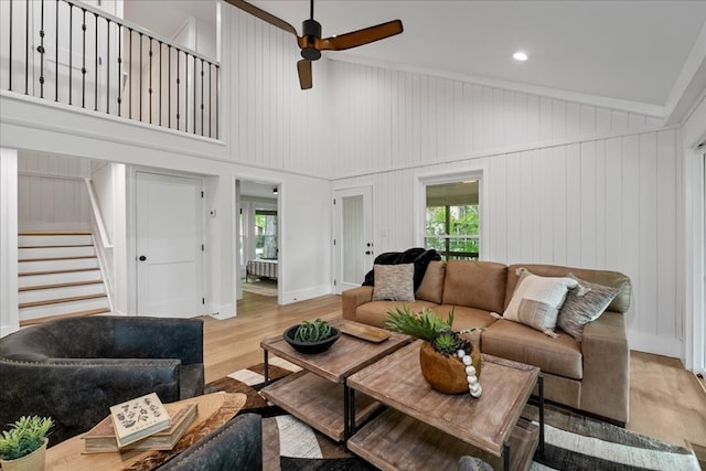 1220 Walnut Rdg, Ellijay, GA 30536 - living area with wood finished floors, a ceiling fan, stairway, plenty of natural light, and recessed lighting