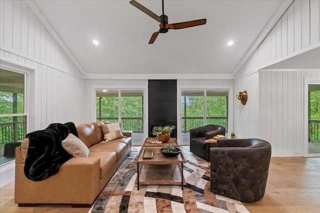 1220 Walnut Rdg, Ellijay, GA 30536 - living room with lofted ceiling, crown molding, ceiling fan, healthy amount of natural light, and wood finished floors