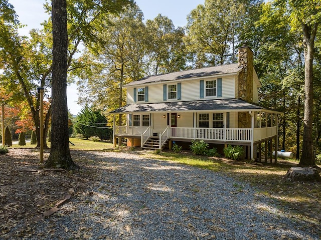 country-style home with covered porch