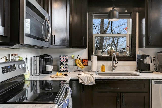 681 Confederate Cir, Murphy, NC 28906 - kitchen featuring a sink, stainless steel appliances, and dark brown cabinets
