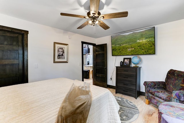 681 Confederate Cir, Murphy, NC 28906 - bedroom featuring baseboards, a ceiling fan, and light wood finished floors