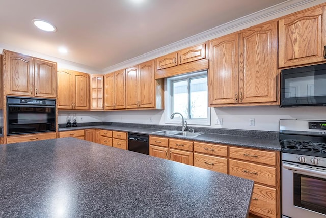 kitchen featuring sink, black appliances, and ornamental molding