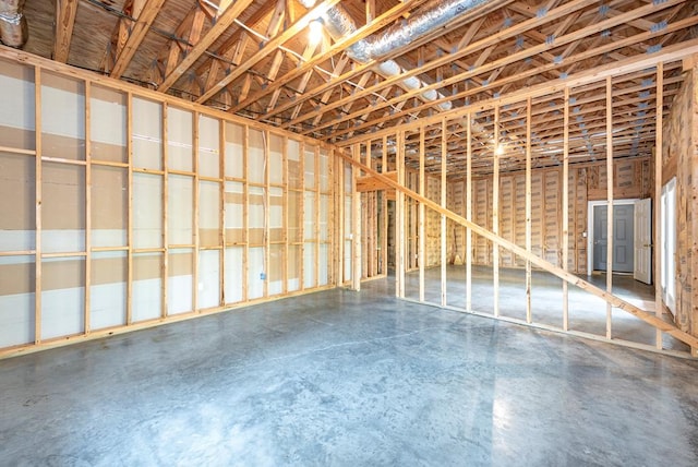 miscellaneous room with concrete flooring