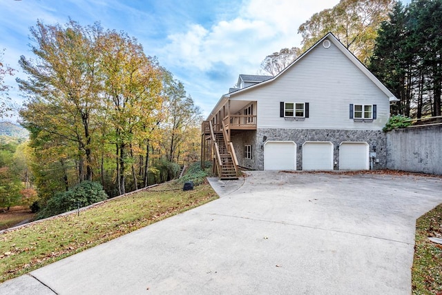 view of property exterior featuring a garage