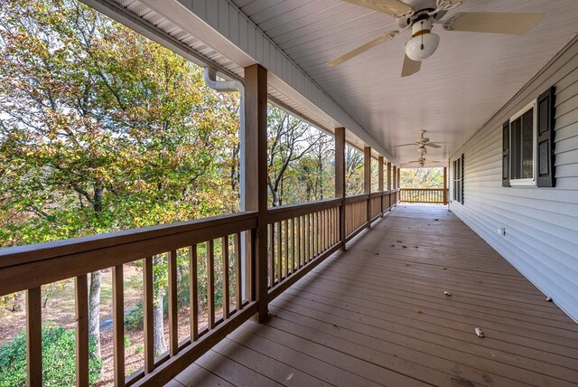 wooden deck with ceiling fan