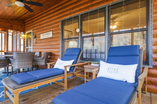 sunroom with ceiling fan