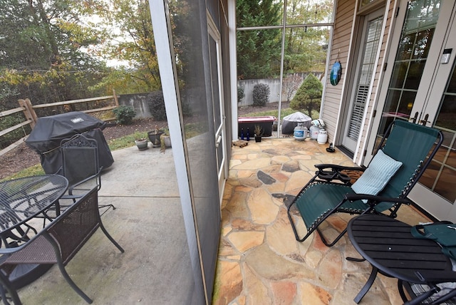 view of patio with french doors and a grill