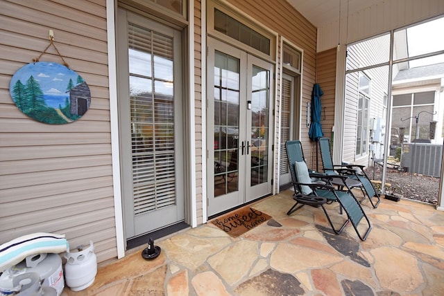 exterior space with french doors and a porch