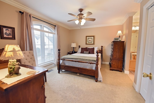 carpeted bedroom with crown molding and ceiling fan