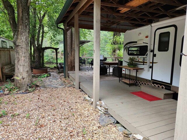 exterior space featuring a wooden deck