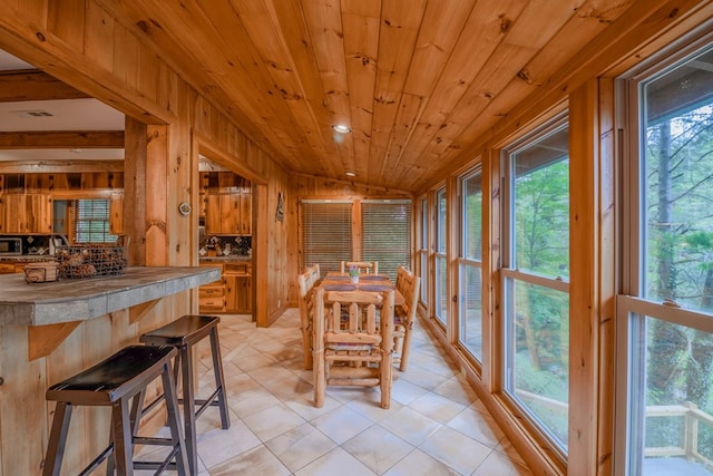 interior space with wood ceiling and vaulted ceiling