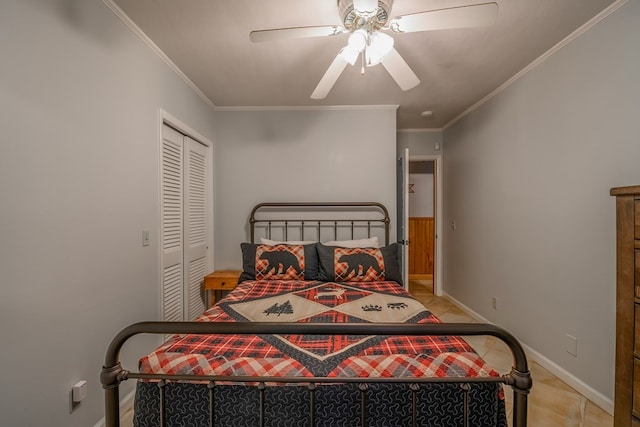 tiled bedroom featuring crown molding, a closet, and ceiling fan