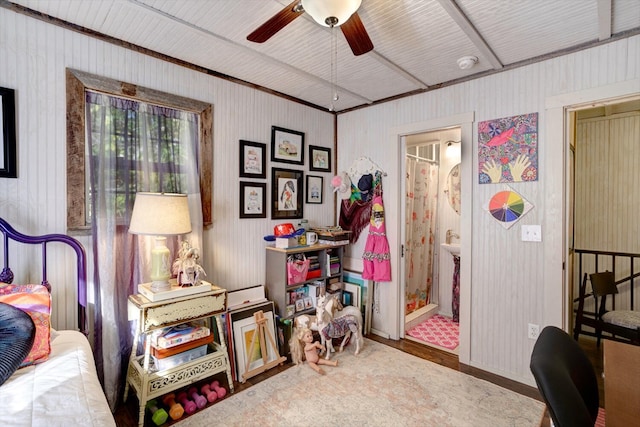 interior space with ceiling fan and hardwood / wood-style flooring