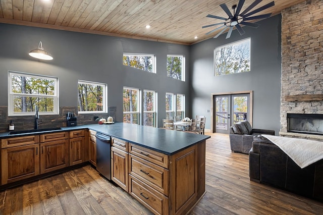 1250 Lost Forest Rd, Ellijay, GA 30536 - kitchen featuring open floor plan, wooden ceiling, a sink, and brown cabinetry