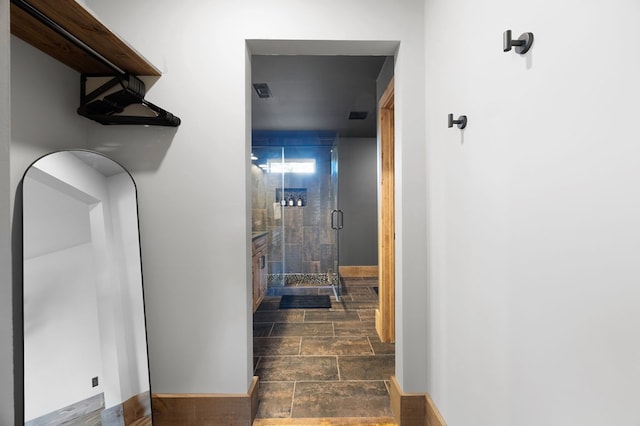 1250 Lost Forest Rd, Ellijay, GA 30536 - hallway with visible vents, baseboards, and stone finish floor