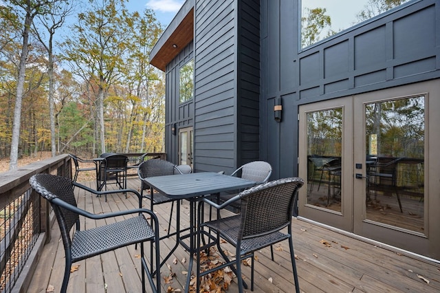 1250 Lost Forest Rd, Ellijay, GA 30536 - deck with outdoor dining area and french doors