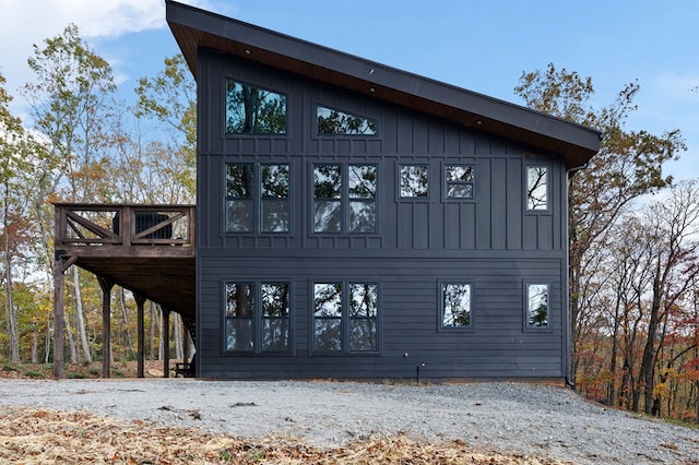 1250 Lost Forest Rd, Ellijay, GA 30536 - view of side of home featuring a wooden deck and board and batten siding