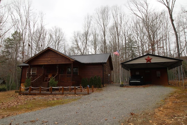 view of front facade with a carport and covered porch