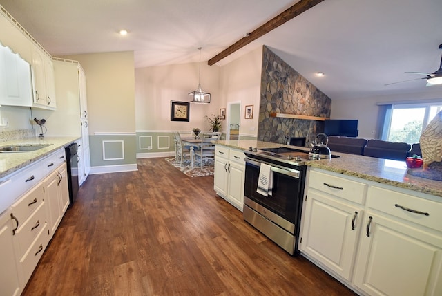 kitchen featuring hanging light fixtures, dark hardwood / wood-style flooring, vaulted ceiling, and stainless steel electric stove