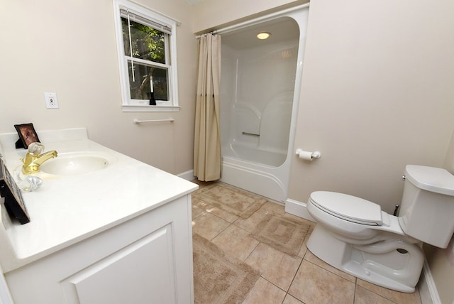 full bathroom with tile patterned flooring, shower / bath combination with curtain, vanity, and toilet