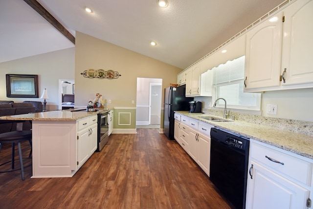 kitchen with black appliances, lofted ceiling with beams, and white cabinets