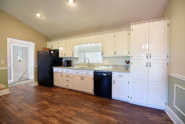 kitchen featuring white cabinets, sink, lofted ceiling, and black appliances