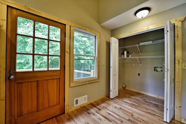 doorway with light hardwood / wood-style floors