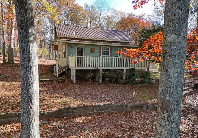 view of front of home featuring a wooden deck