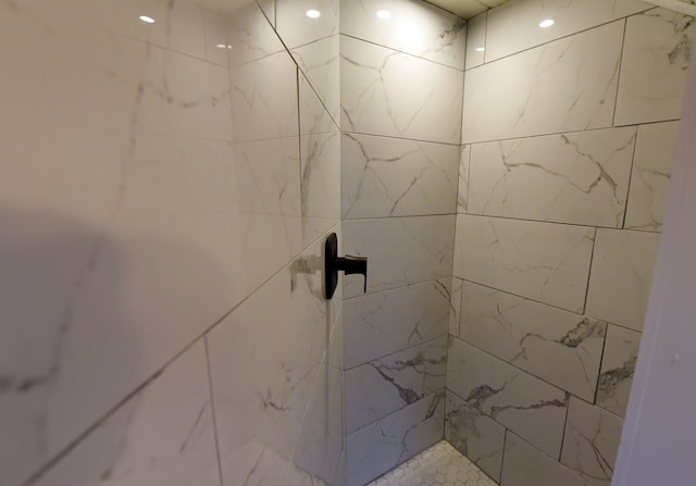 room details with a tile shower