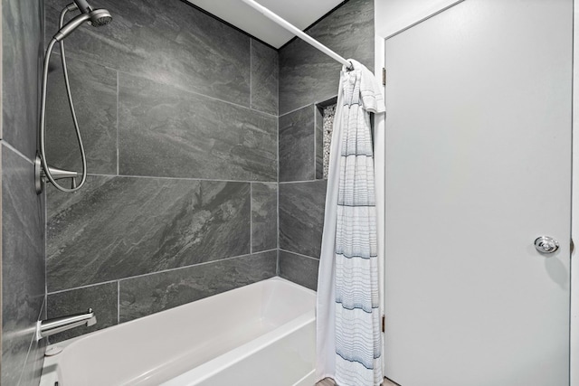 full bathroom with shower / bath combo