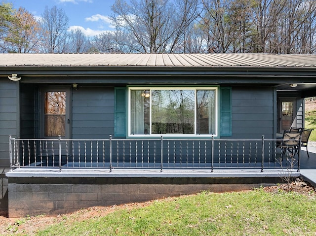 view of home's exterior featuring metal roof