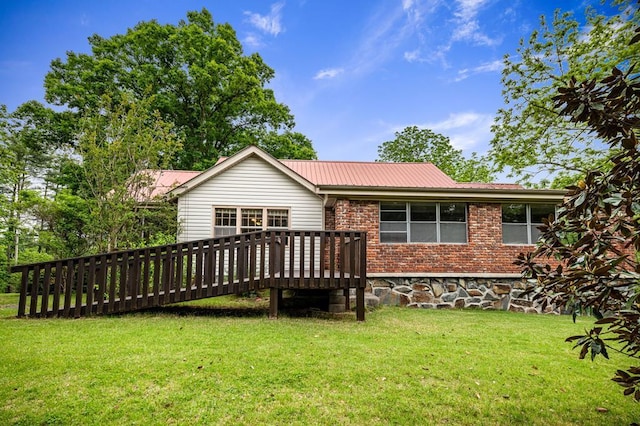 16 Hollow Springs Rd, Blue Ridge, GA 30513 - rear view of property with a lawn, a wooden deck, metal roof, and brick siding