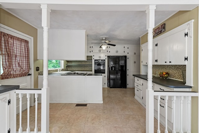 16 Hollow Springs Rd, Blue Ridge, GA 30513 - kitchen with black appliances, ceiling fan, dark countertops, tasteful backsplash, and white cabinets
