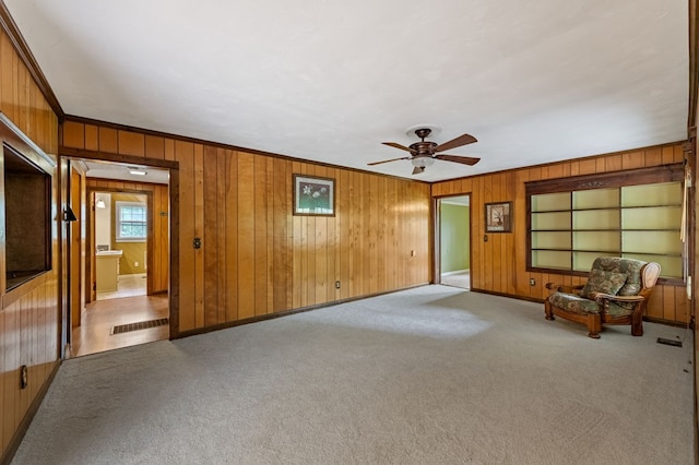16 Hollow Springs Rd, Blue Ridge, GA 30513 - unfurnished room featuring carpet floors, wooden walls, a ceiling fan, baseboards, and ornamental molding