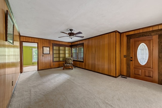 16 Hollow Springs Rd, Blue Ridge, GA 30513 - carpeted foyer entrance featuring wood walls, ornamental molding, ceiling fan, and baseboards