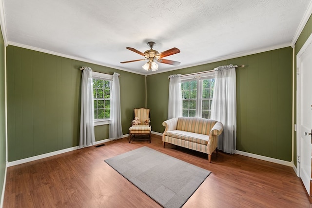 16 Hollow Springs Rd, Blue Ridge, GA 30513 - living area with ornamental molding, ceiling fan, wood finished floors, and baseboards