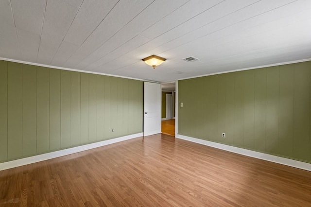 16 Hollow Springs Rd, Blue Ridge, GA 30513 - empty room featuring wood finished floors, baseboards, and crown molding