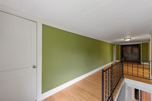 16 Hollow Springs Rd, Blue Ridge, GA 30513 - hall featuring wood finished floors, ornamental molding, an upstairs landing, and baseboards