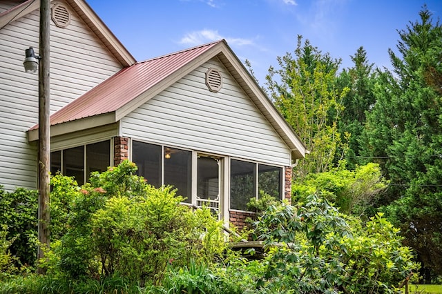 16 Hollow Springs Rd, Blue Ridge, GA 30513 - view of property exterior with a sunroom and metal roof