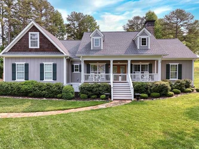 571 Owen Vis, Blairsville, GA 30512 - cape cod-style house with a chimney, a porch, a front yard, and board and batten siding