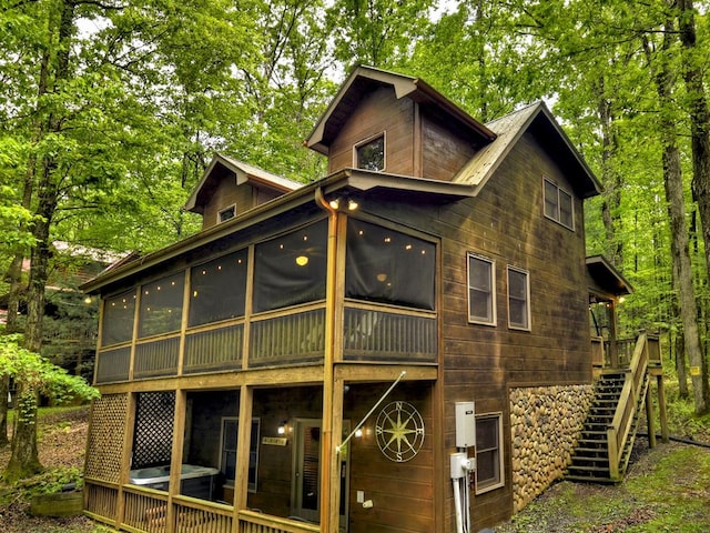850 Mountain Lake Cir, Blue Ridge, GA 30513 - back of house with a sunroom, stairway, and a deck