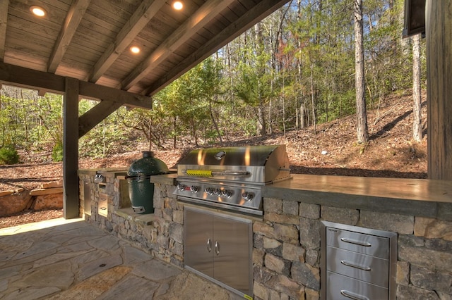 view of patio / terrace with area for grilling and an outdoor kitchen