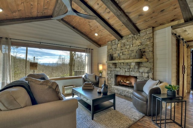 living room with lofted ceiling with beams, wood-type flooring, and wood ceiling