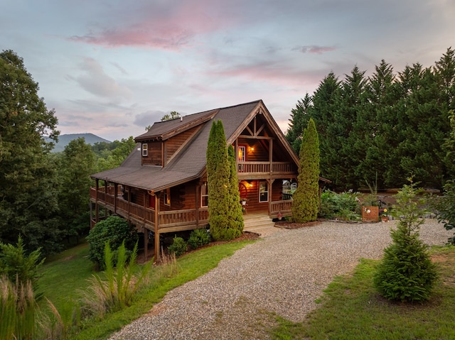 log cabin featuring a porch