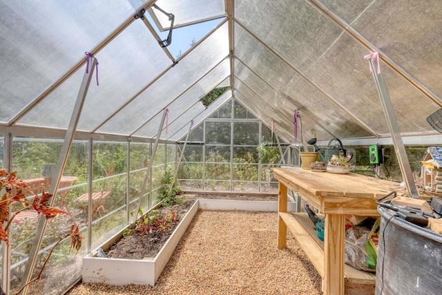 sunroom / solarium with lofted ceiling